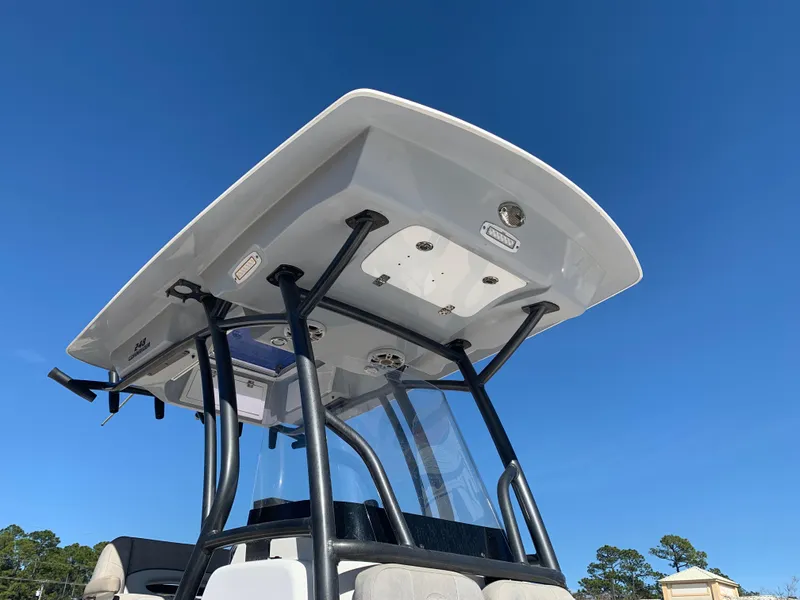 Slide: The Image of 2018 Sea Fox 248 Commander boat with T-top against clear blue sky. - 9