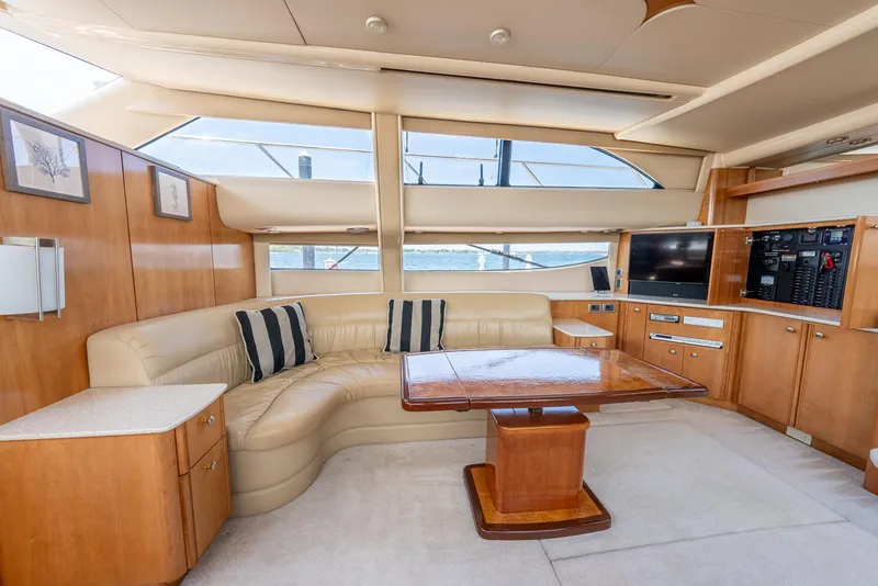 Slide: The Image of Luxurious interior of 2004 Meridian 459 Motor Yacht with plush seating and elegant wood finishes. - 31