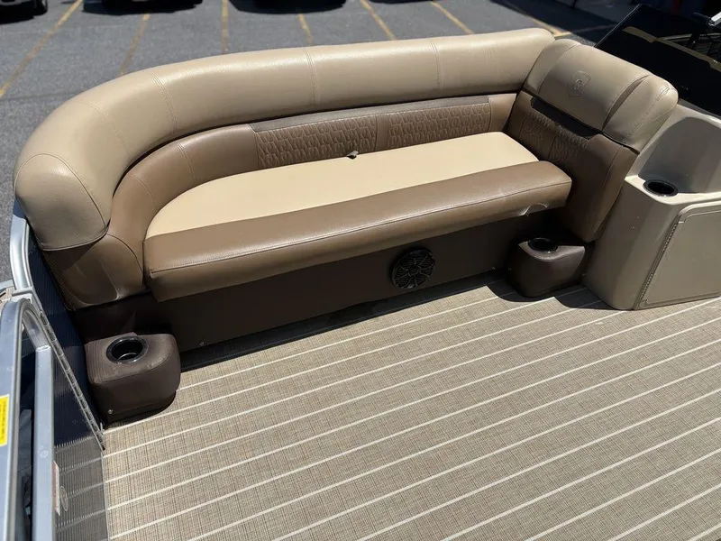 Slide: The Image of Beige and brown seating on 2021 Godfrey SW 2086 C boat with cup holders. - 10