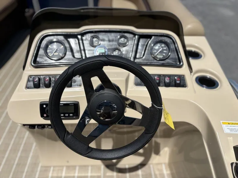 Slide: The Image of Steering wheel and dashboard of 2021 Godfrey SW 2086 C boat. - 6