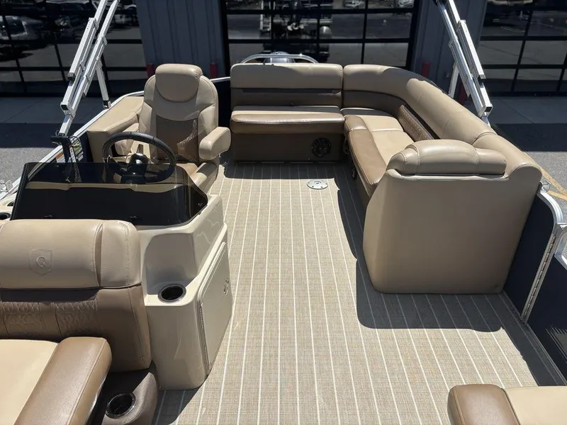 Slide: The Image of Luxurious 2021 Godfrey SW 2086 C pontoon boat interior with plush seating and modern helm. - 9