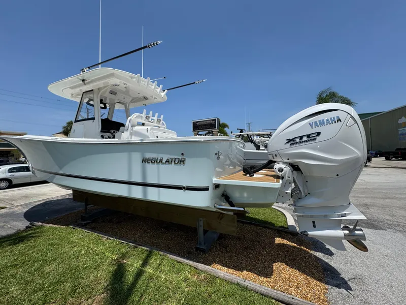 The Image of 2024 Regulator 31 boat with Yamaha engine displayed outdoors. - 0