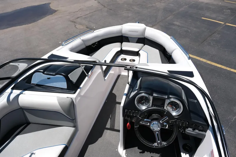 Slide: The Image of 2017 Moomba Mondo boat interior with sleek dashboard and comfortable seating. - 13