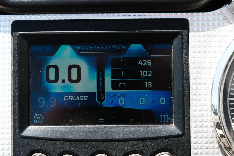 Slide: The Image of 2017 Moomba Mondo dashboard display showing speed, cruise control, and ballast settings. - 23