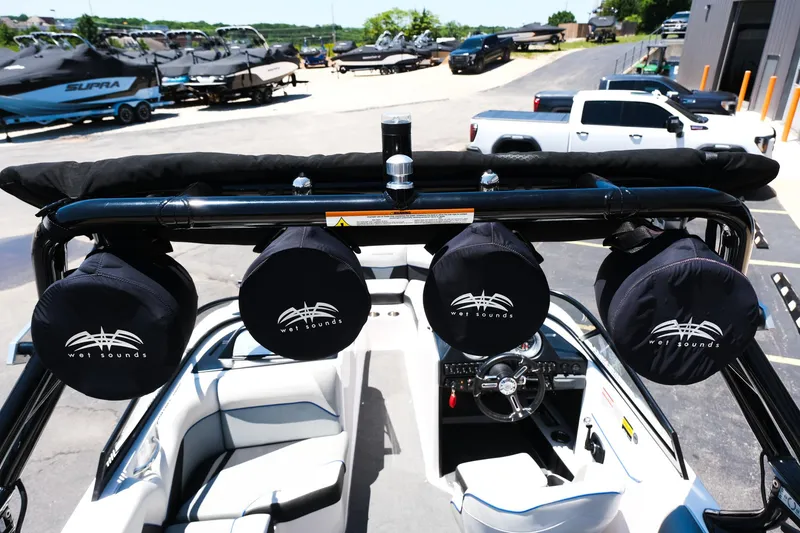Slide: The Image of 2017 Moomba Mondo boat with Wet Sounds speakers, parked in a marina lot. - 29
