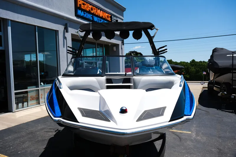 Slide: The Image of 2017 Moomba Mondo boat parked outside Performance Marine Watersports dealership. - 8