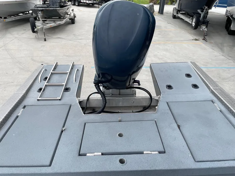 Slide: The Image of 2009 Hanko 247 boat with outboard motor and deck view. - 12