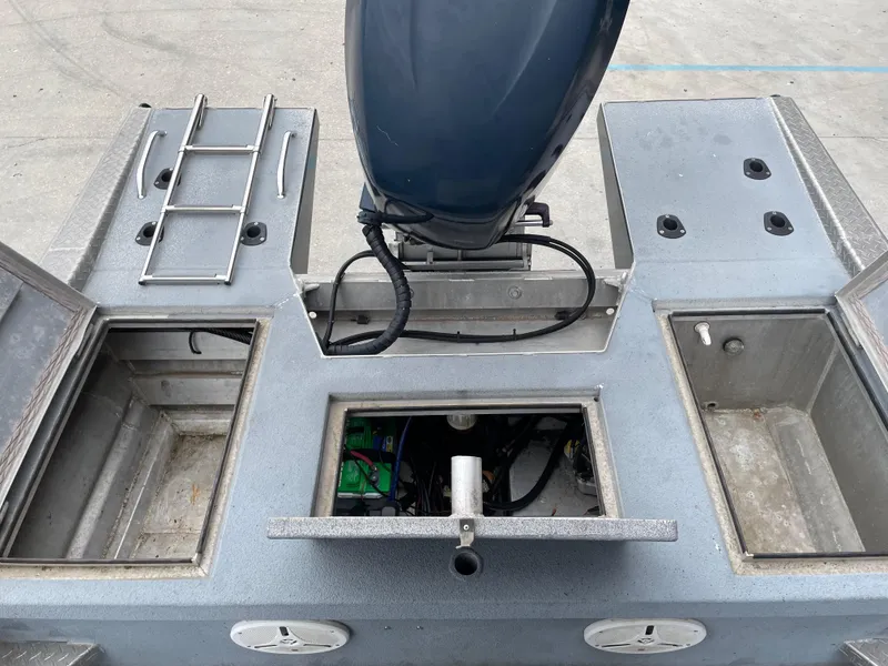 Slide: The Image of Hanko 247 boat interior, 2009 model, showing storage compartments and engine area. - 13