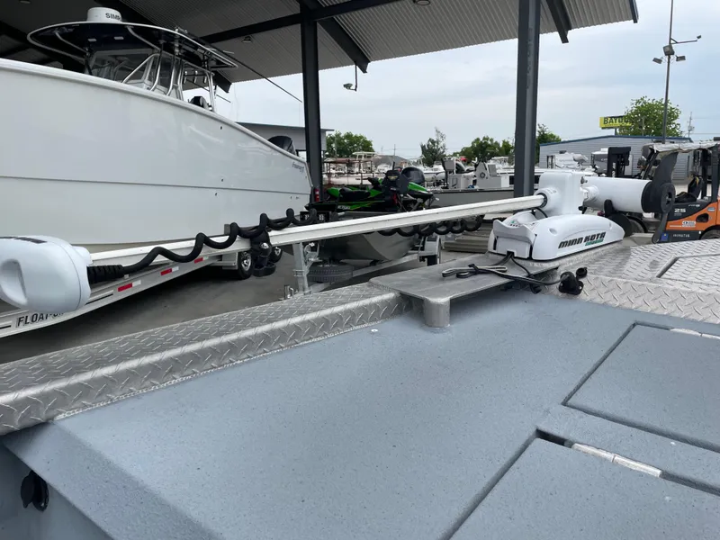 Slide: The Image of Boat with Minn Kota trolling motor on a Hanko 247, 2009 model, at a marina. - 14