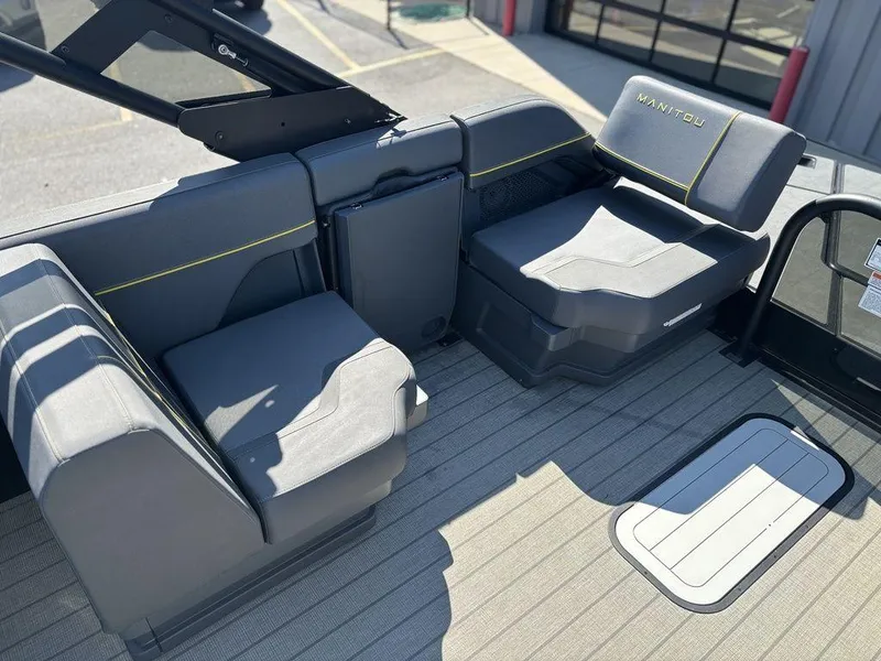 Slide: The Image of 2023 Manitou Explore 22 Max Bench interior with gray seating and modern design. - 4