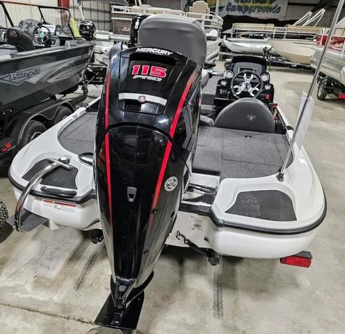 Slide: The Image of 2025 Nitro Z17 boat with Mercury 115 engine, displayed in a showroom. - 3