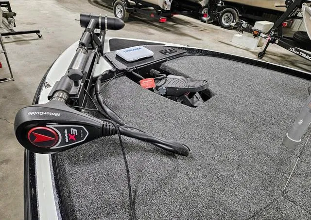 Slide: The Image of 2025 Nitro Z17 boat deck with MotorGuide trolling motor and foot pedal. - 6