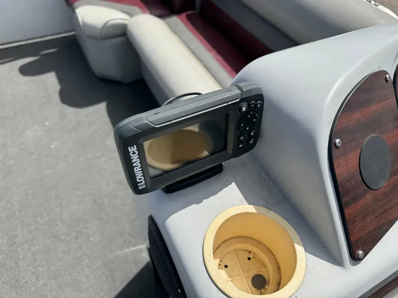 Slide: The Image of Fishfinder on a 2001 Paragon 2200SE boat with cup holder and seating. - 10