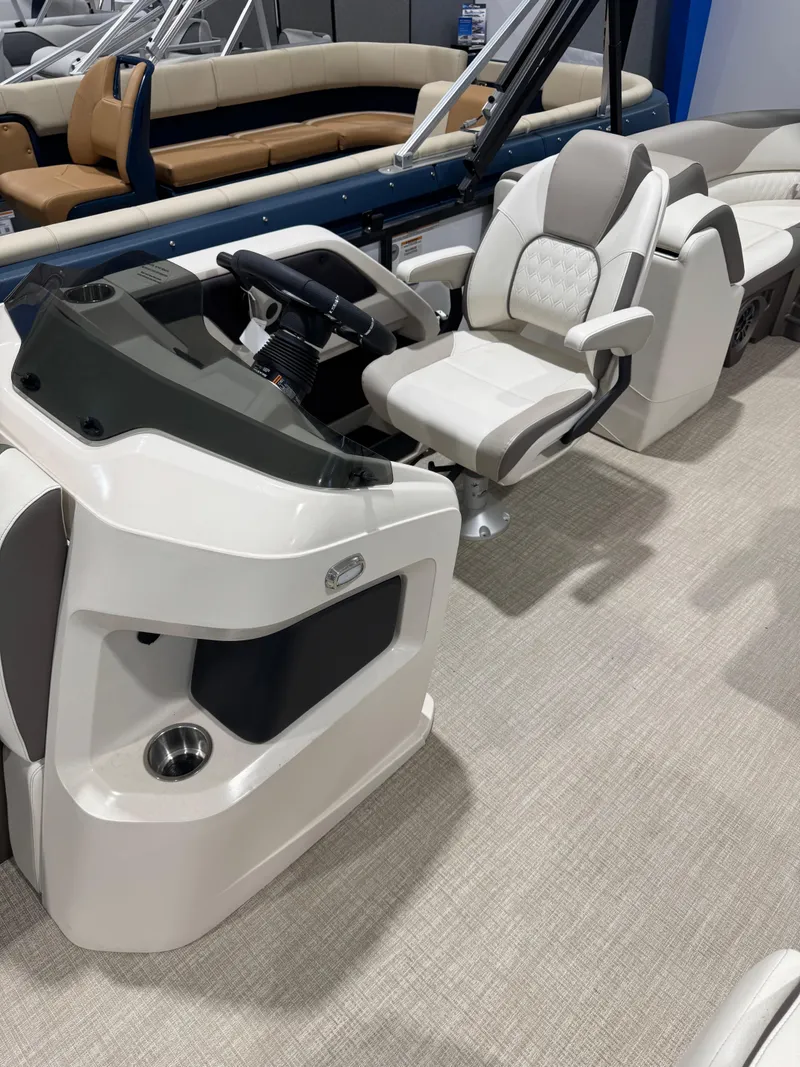 Slide: The Image of 2024 Avalon 2385 25 LSZ QL boat interior with modern helm and seating. - 3