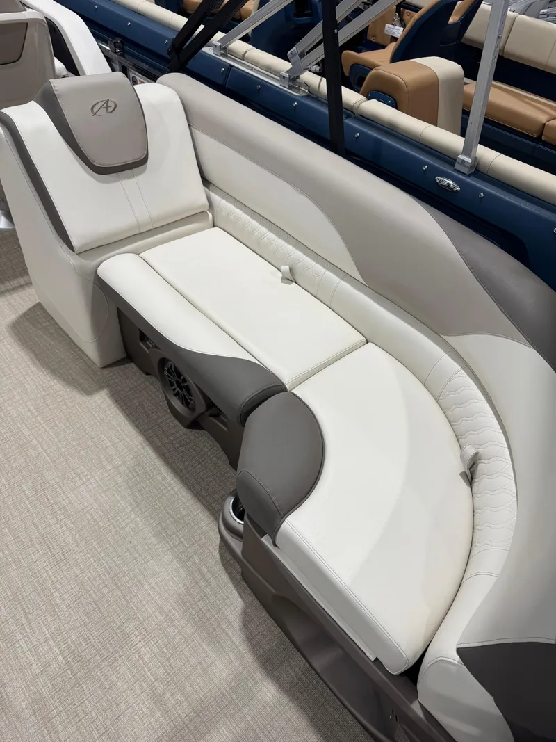Slide: The Image of 2024 Avalon 2385 25 LSZ QL boat interior with white and gray seating. - 5