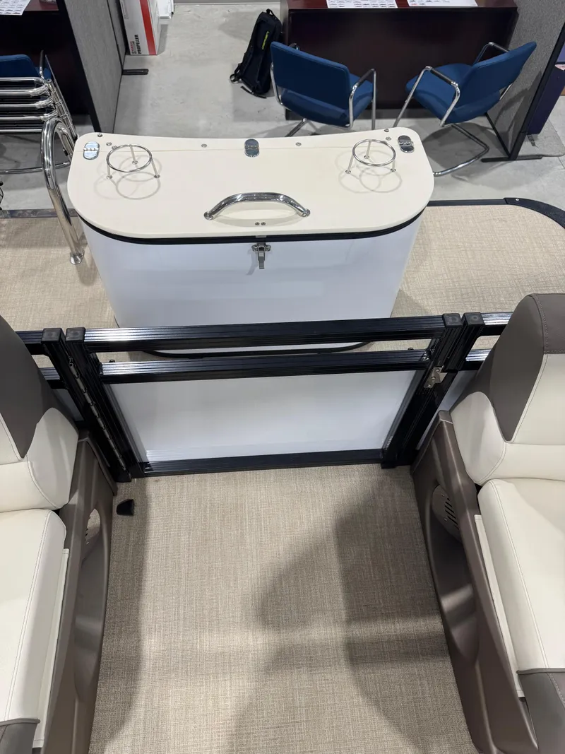 Slide: The Image of 2024 Avalon 2385 25 LSZ QL boat interior with seating and control panel. - 6