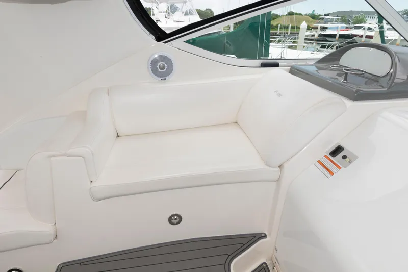 Slide: The Image of 2008 Cruisers Yachts 415 Express Motoryacht interior with white seating and modern design. - 11