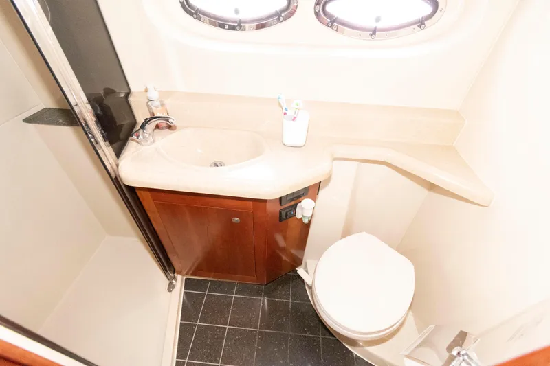 Slide: The Image of Luxurious bathroom in 2008 Cruisers Yachts 415 Express Motoryacht with modern fixtures. - 25