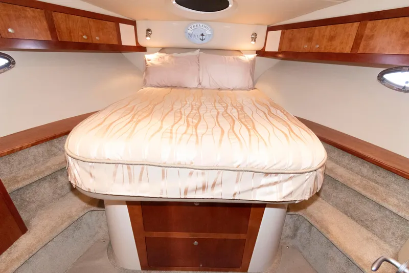 Slide: The Image of Luxurious cabin interior of 2008 Cruisers Yachts 415 Express Motoryacht with cozy bed. - 26