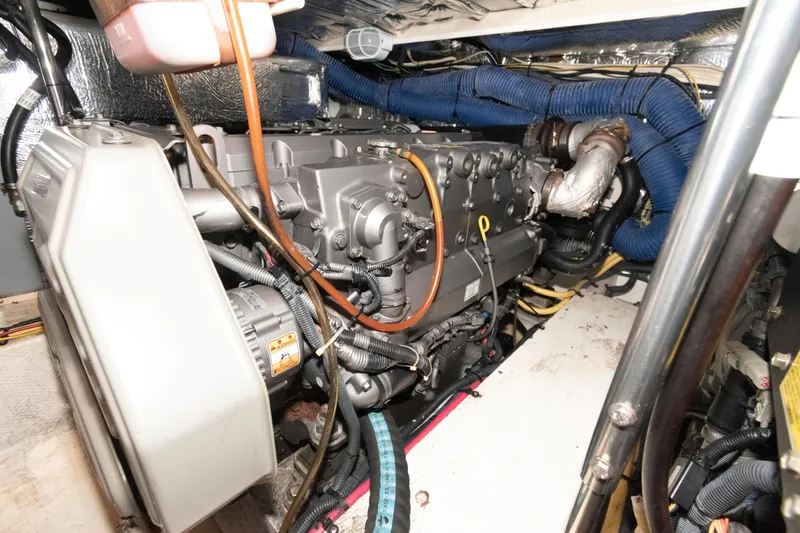 Slide: The Image of Engine room of 2008 Cruisers Yachts 415 Express Motoryacht, showcasing detailed machinery and components. - 30