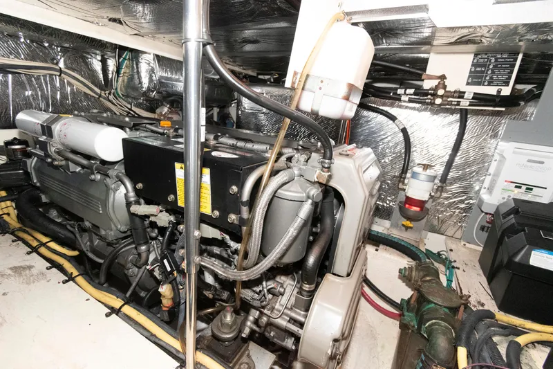 Slide: The Image of Engine room of 2008 Cruisers Yachts 415 Express Motoryacht, showcasing mechanical components. - 31