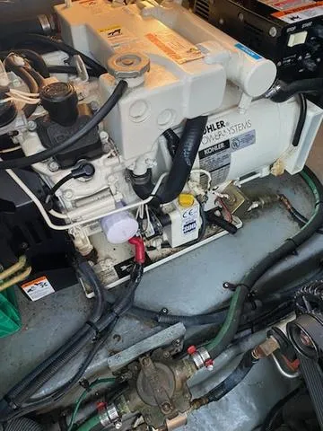 Slide: The Image of Engine compartment of a 2004 Sea Ray 260 Sundancer with Kohler power system. - 3