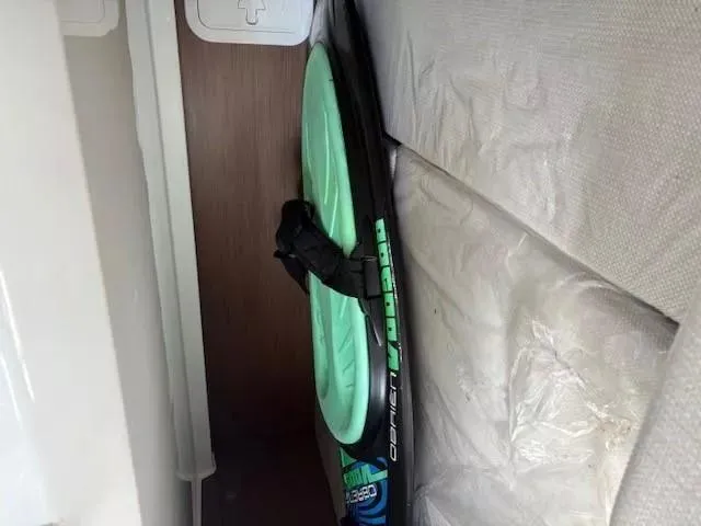 Slide: The Image of Stored surfboard inside 2020 Jeanneau Leader 9.0 CC boat cabin. - 24