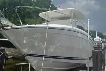 Slide: The Image of 2020 Jeanneau Leader 9.0 CC boat docked, featuring sleek design and modern amenities. - 3