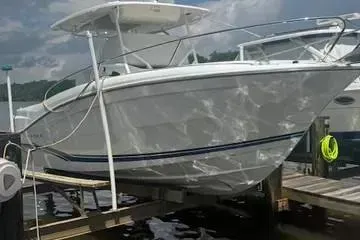 Slide: The Image of 2020 Jeanneau Leader 9.0 CC boat docked at marina under cloudy sky. - 5