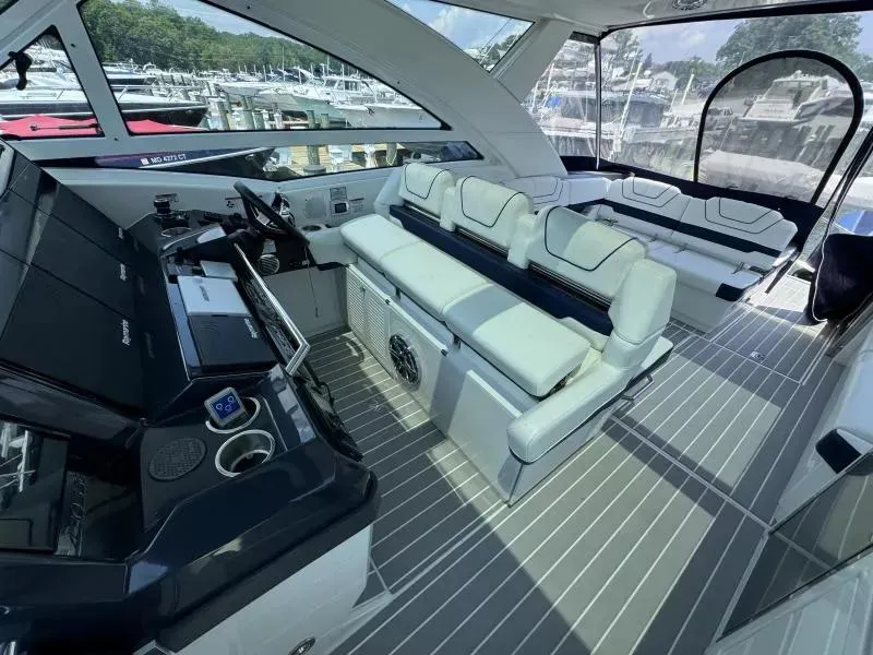 Slide: The Image of 2020 Formula 430 Super Sport Crossover interior with luxurious seating and modern controls. - 11
