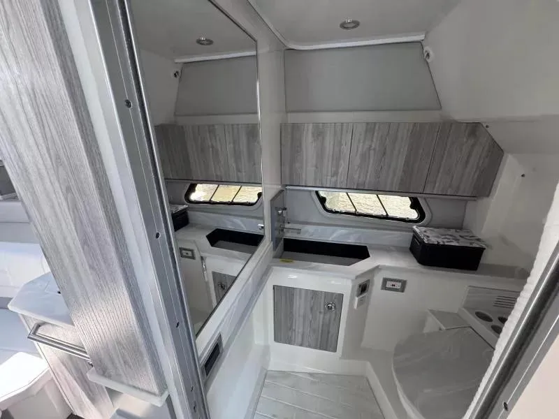 Slide: The Image of 2020 Formula 430 Super Sport Crossover interior with modern cabinetry and sleek design. - 16