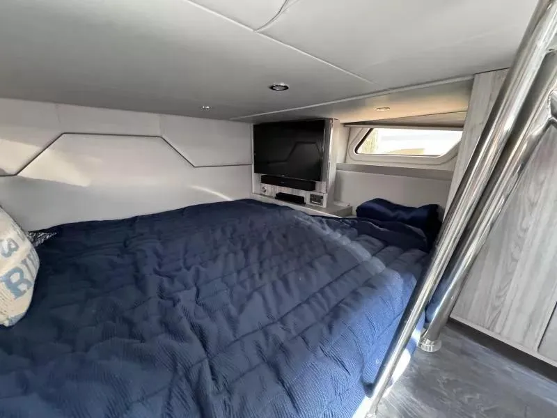 Slide: The Image of 2020 Formula 430 Super Sport Crossover cabin with bed and TV. - 18