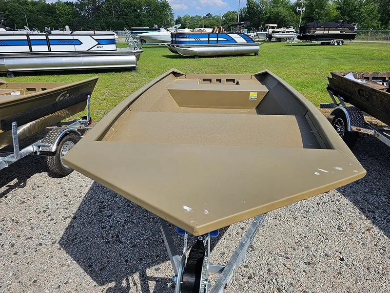 Slide: The Image of 2025 G3 Gator Tough 1548 VBW boat on trailer, displayed outdoors. - 10