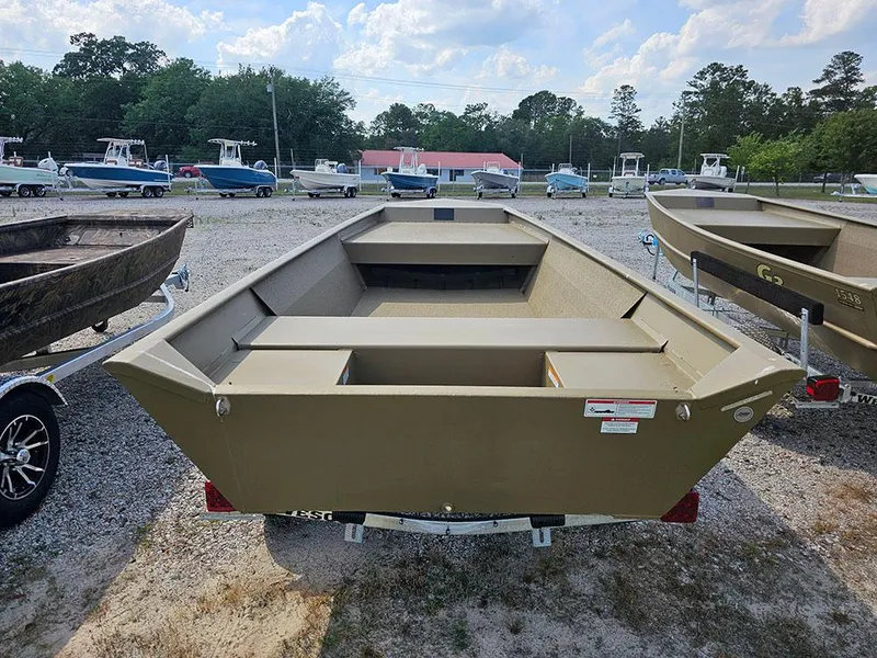 Slide: The Image of 2025 G3 Gator Tough 1548 VBW boat displayed outdoors on gravel lot. - 14