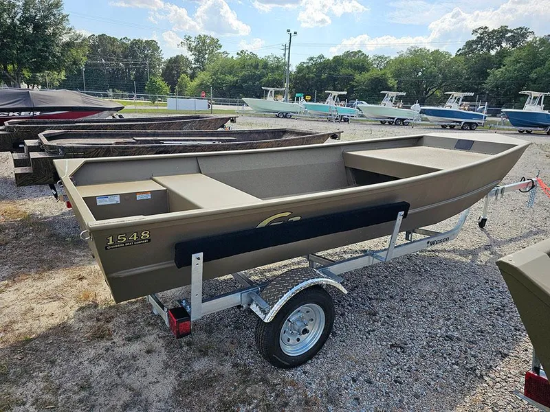 Slide: The Image of 2025 G3 Gator Tough 1548 VBW boat on trailer, parked outdoors. - 8
