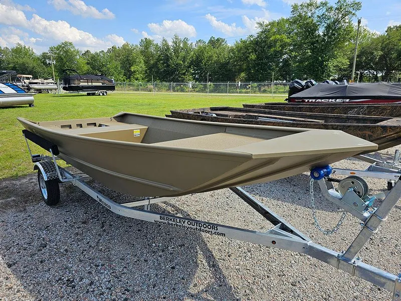 Slide: The Image of 2025 G3 Gator Tough 1548 VBW boat on trailer, parked outdoors under blue sky. - 9