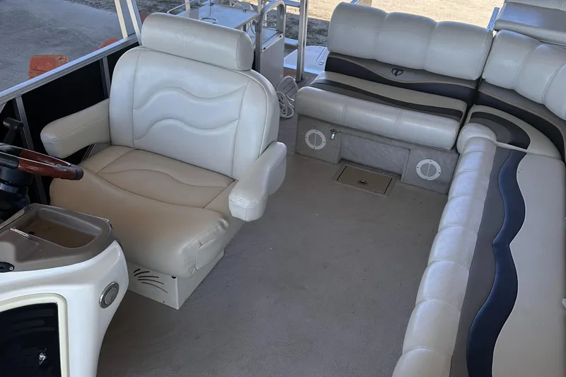 Slide: The Image of Interior of 2011 Tahoe Pontoon 2685FS Sierra Funship with white leather seating. - 5
