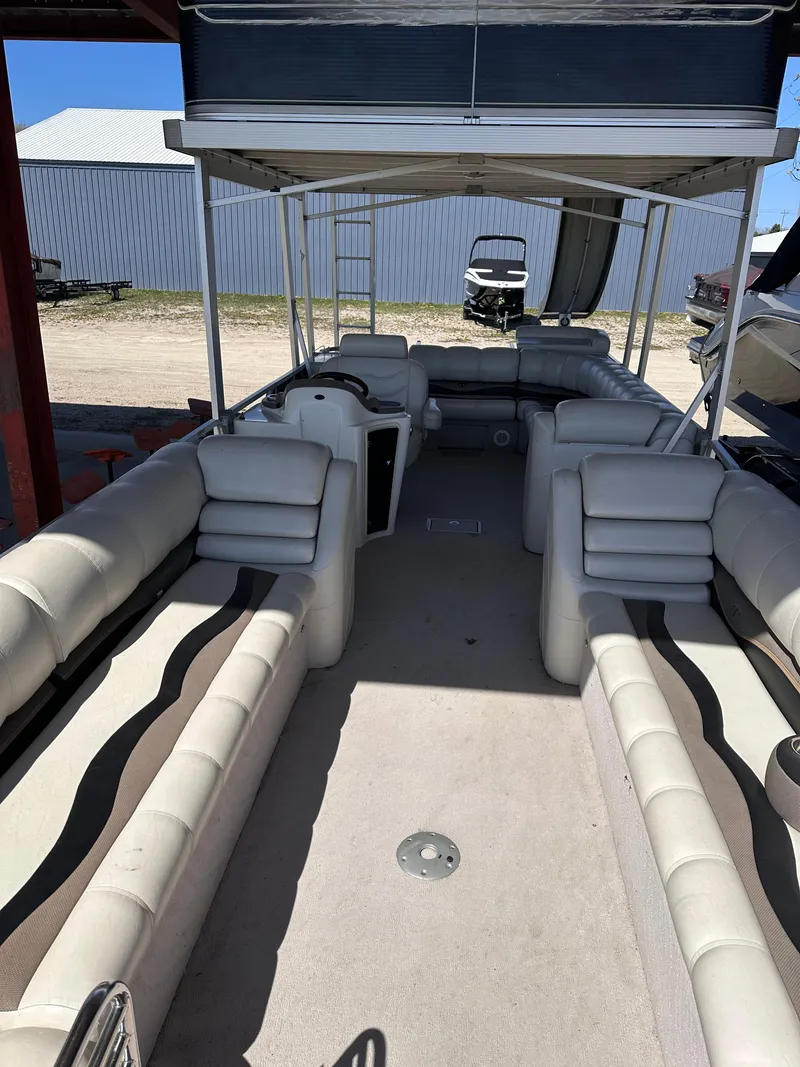 Slide: The Image of 2011 Tahoe Pontoon 2685FS Sierra Funship with spacious seating and canopy. - 7