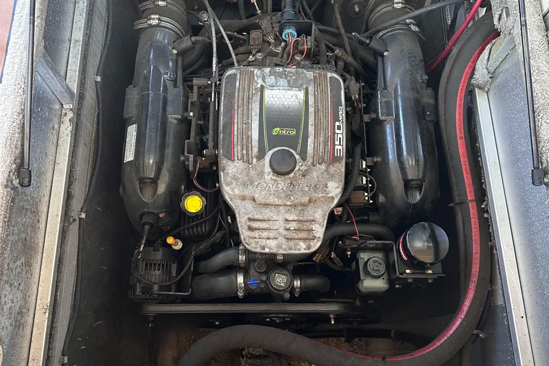 Slide: The Image of Engine of a 2011 Tahoe Pontoon 2685FS Sierra Funship, featuring a 350 MAG motor. - 8