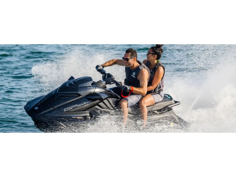 Slide: The Image of 2024 Yamaha GP SVHO jet ski with two riders enjoying a thrilling water ride. - 18