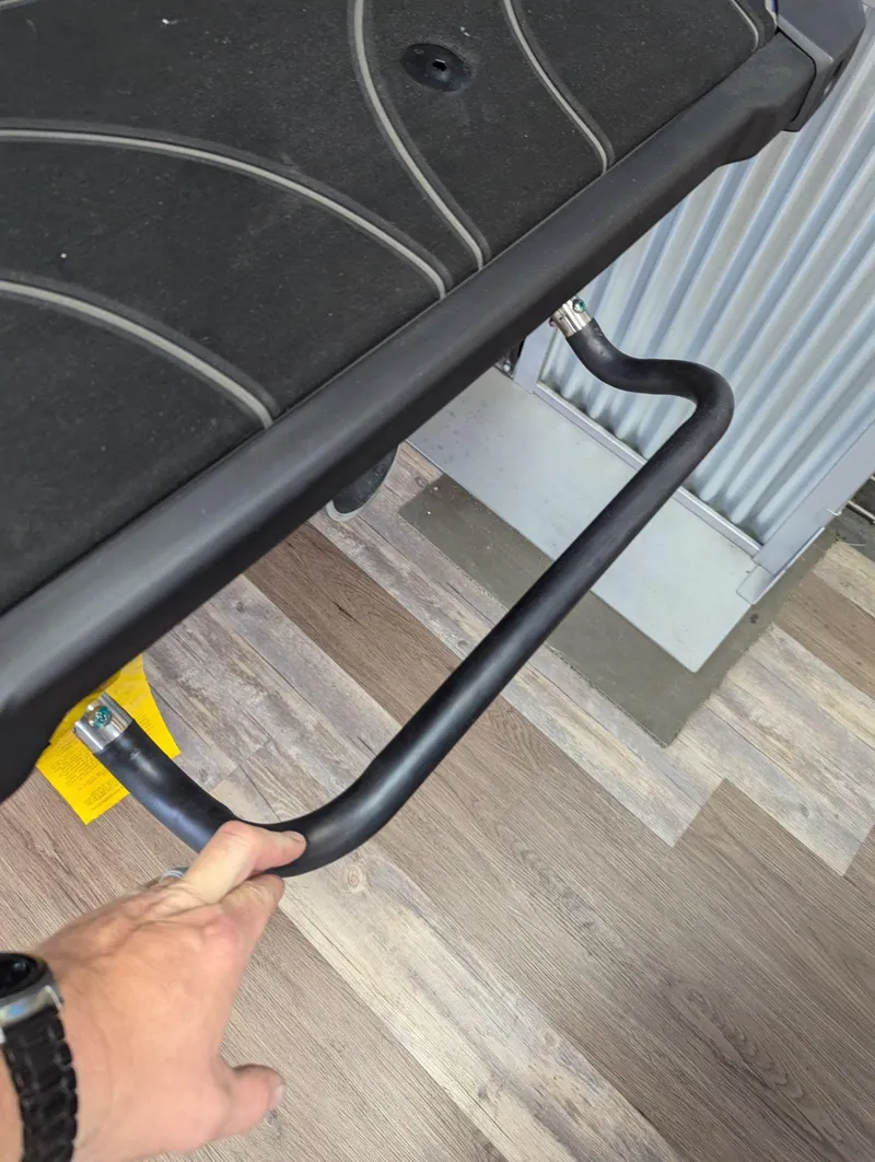 Slide: The Image of 2024 Yamaha Boats GP SVHO swim platform with a hand holding a metal handle. - 9