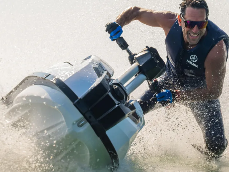 Slide: The Image of Man riding 2025 Yamaha SUPERJET jet ski, creating splashes in the water. - 23