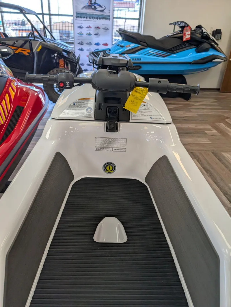 Slide: The Image of 2025 Yamaha Boats SUPERJET in showroom, featuring handlebars and sleek design. - 6