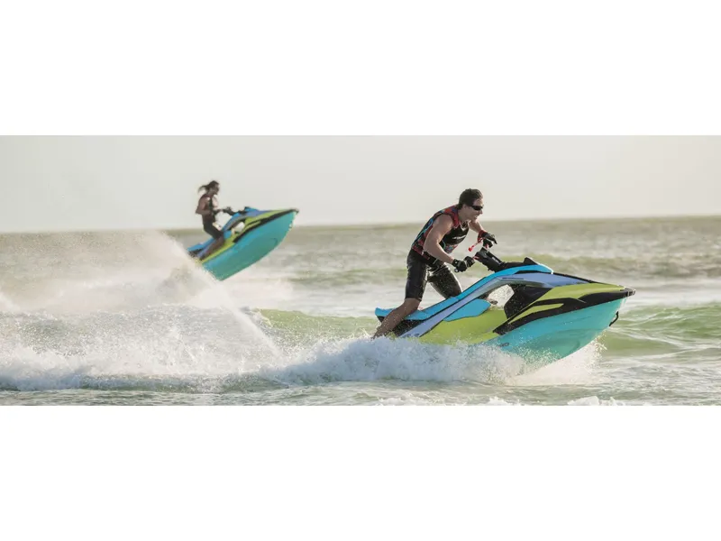 Slide: The Image of 2025 Yamaha Jetblaster PRO 2-Up jet skis riding waves, showcasing speed and agility. - 8