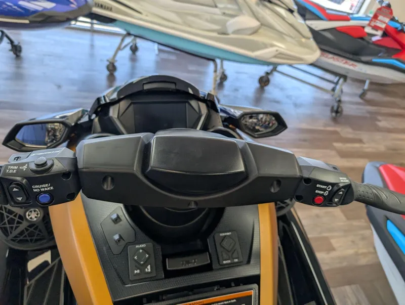 Slide: The Image of 2025 Yamaha FX Cruiser HO with Audio, dashboard view, featuring control buttons and display. - 11