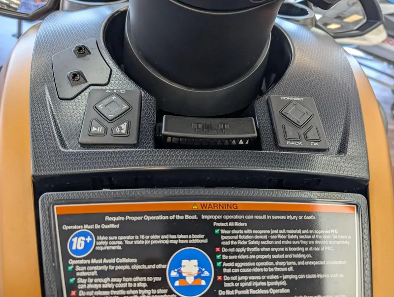 Slide: The Image of Control panel of 2025 Yamaha FX Cruiser HO with Audio, featuring audio and connect buttons. - 13