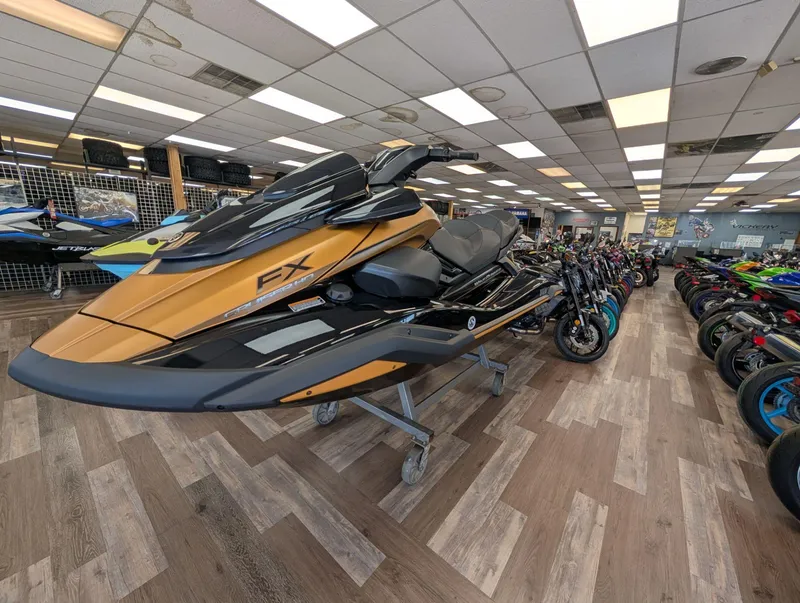 Slide: The Image of 2025 Yamaha FX Cruiser HO with Audio displayed in a showroom, surrounded by motorcycles. - 18