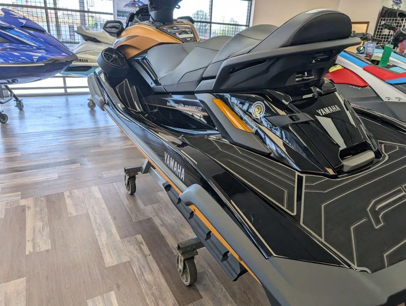 Slide: The Image of 2025 Yamaha FX Cruiser HO with Audio, sleek design, displayed indoors on wooden floor. - 6