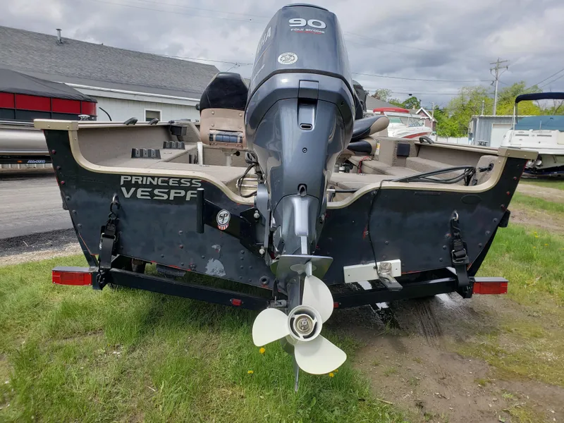 Slide: The Image of 2013 G3 V172C boat with 90 HP motor on grassy area. - 3