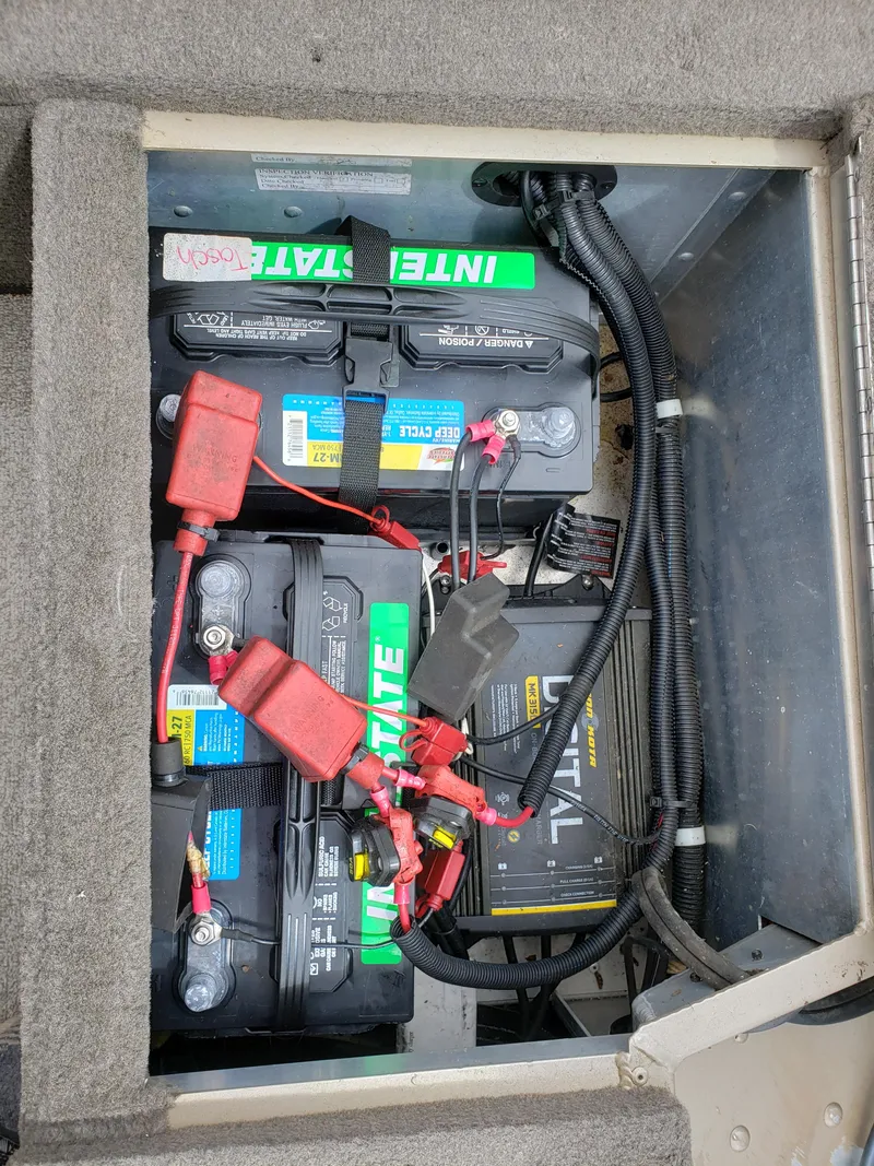 Slide: The Image of Boat battery compartment with multiple batteries and wiring, G3 V172C, 2013 model. - 6